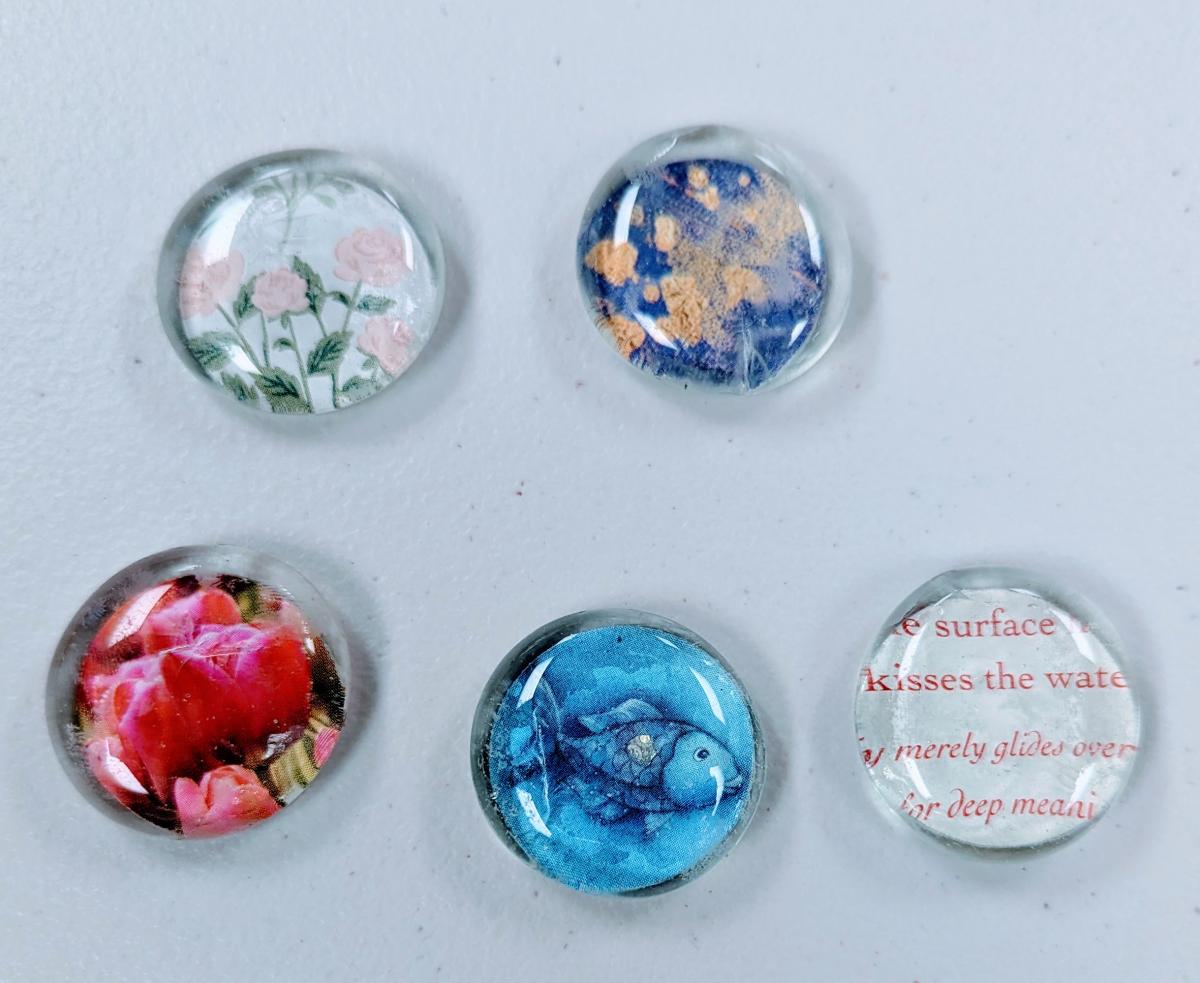 Five glass marble magnets